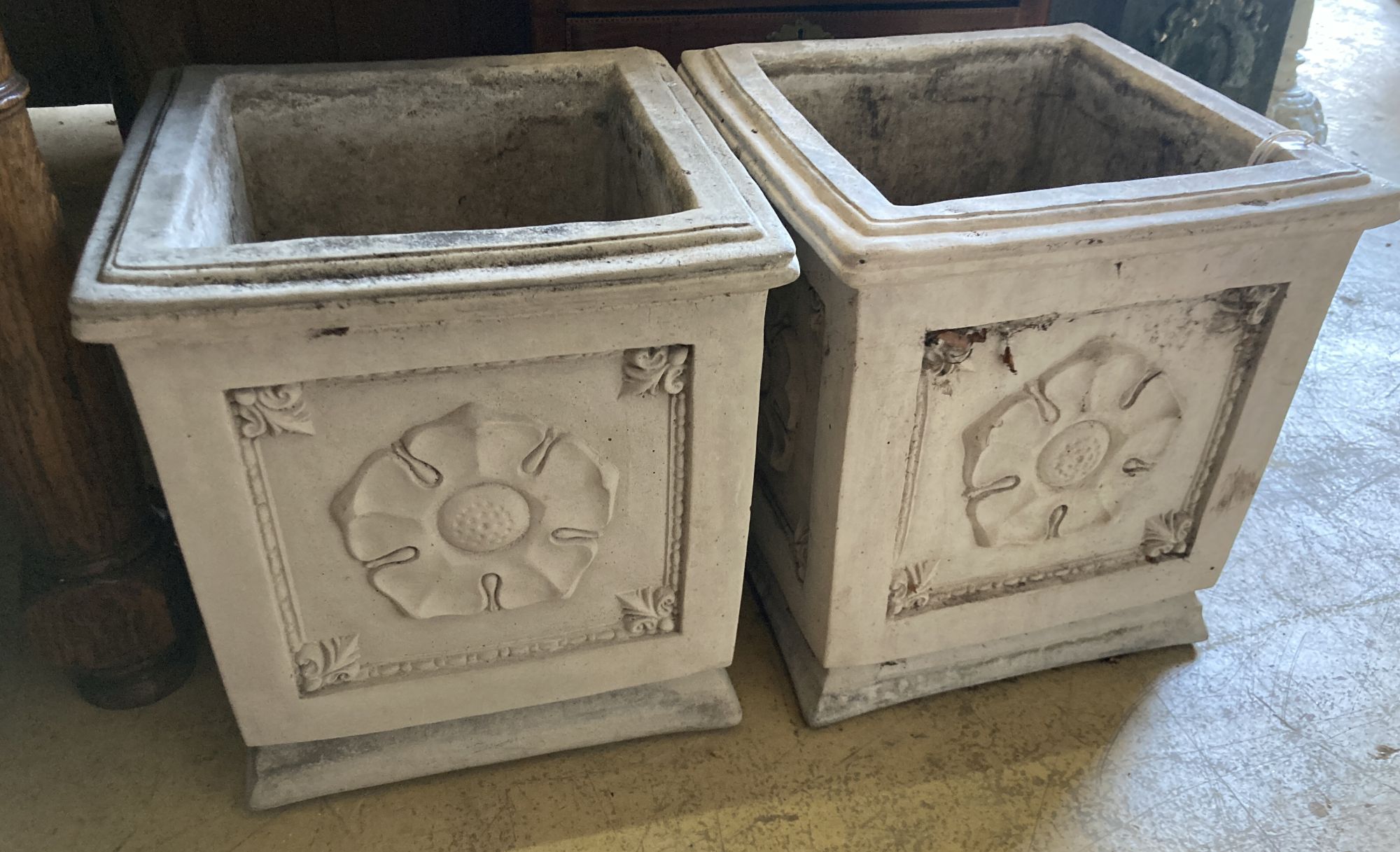 A pair of reconstituted stone square garden planters, width 40cm, height 43cm